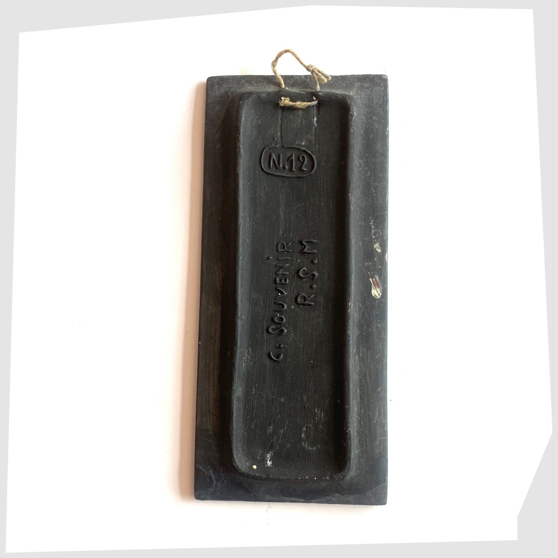 Rear of the rectangular San Marino Pottery Wall Plaque with impressed model number, shown on a white background