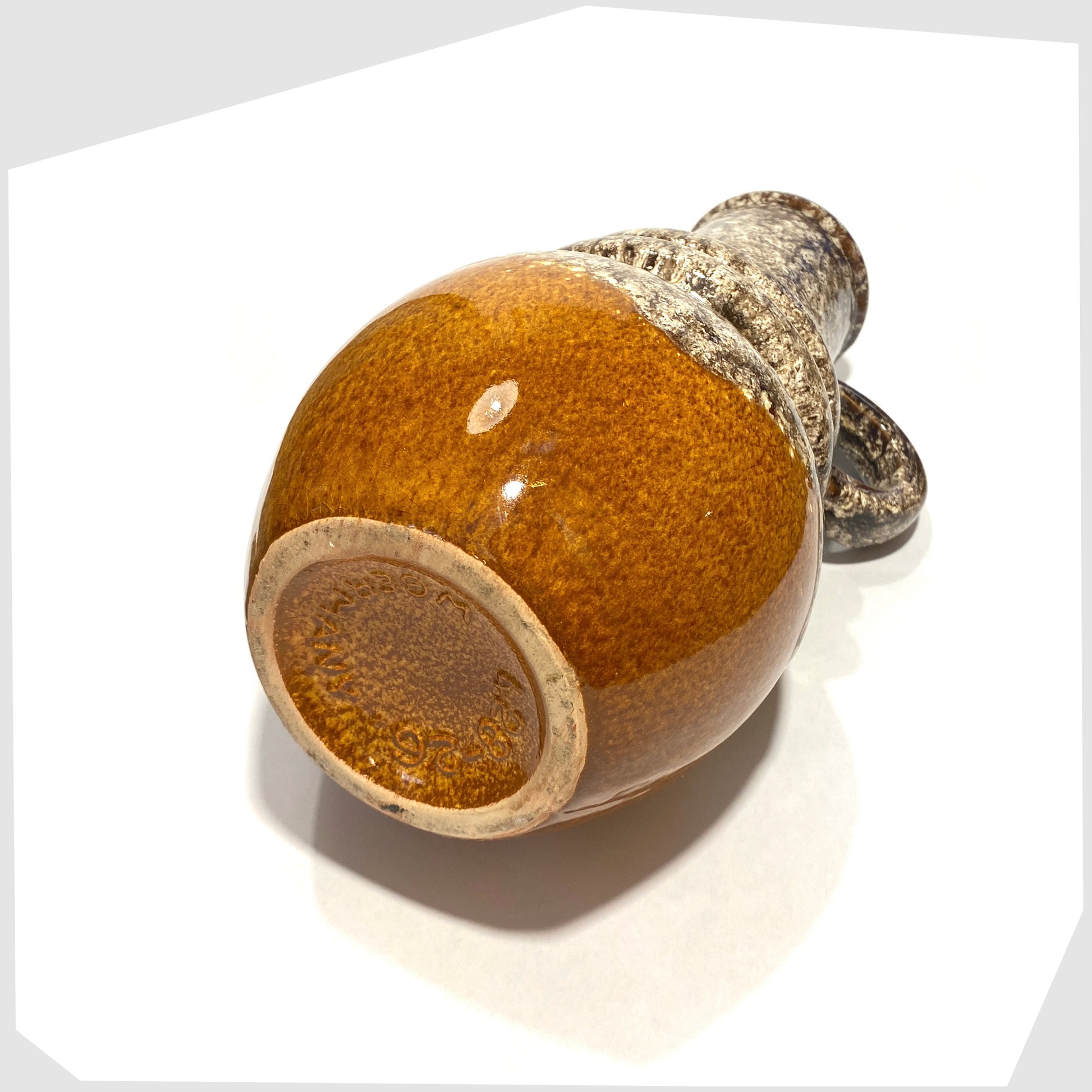 base of the scheurich keramik 428-26 vase with amber and fat lava glaze