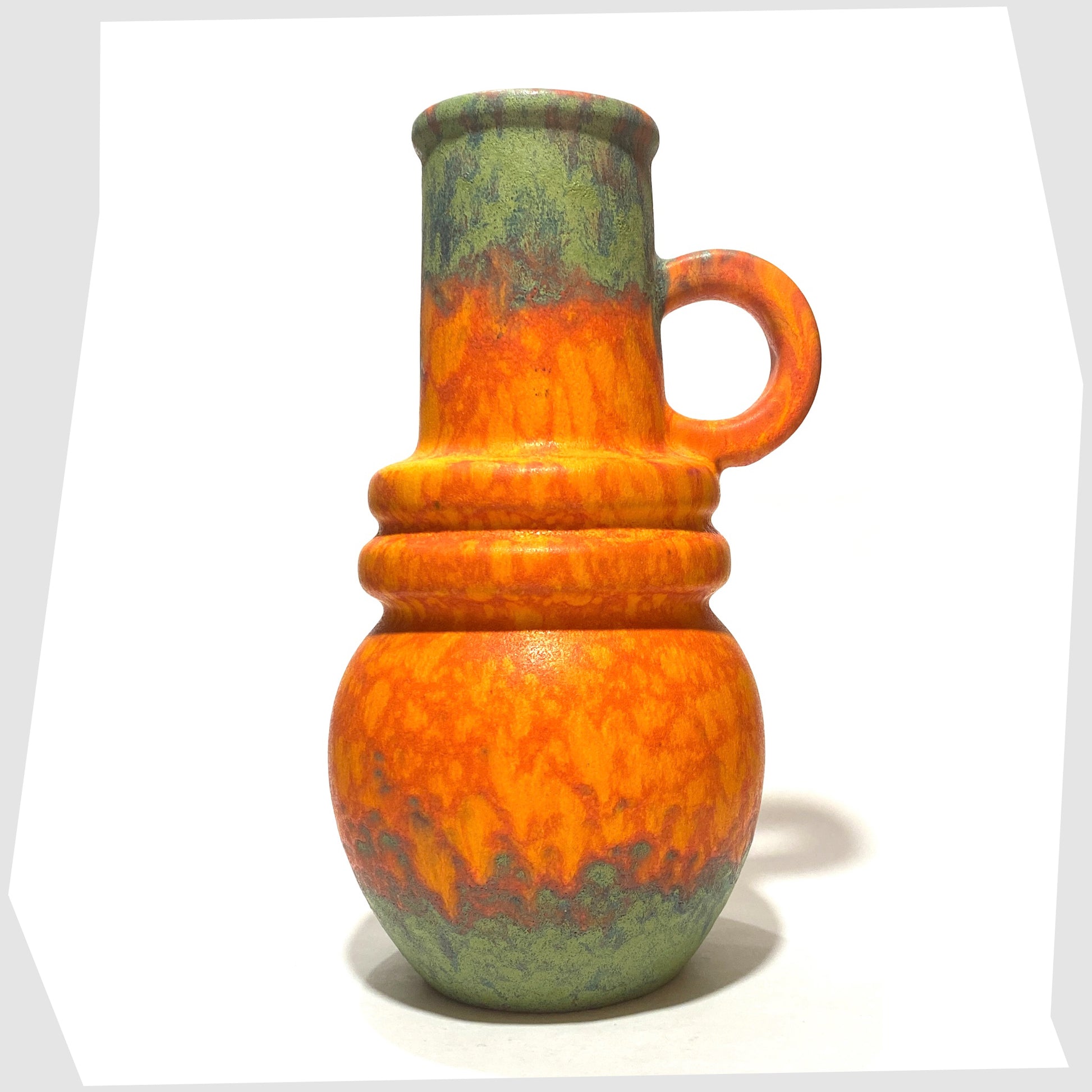 scheurich keramik 428-26 vase finished in a volcanic orange glaze with vivid matte green