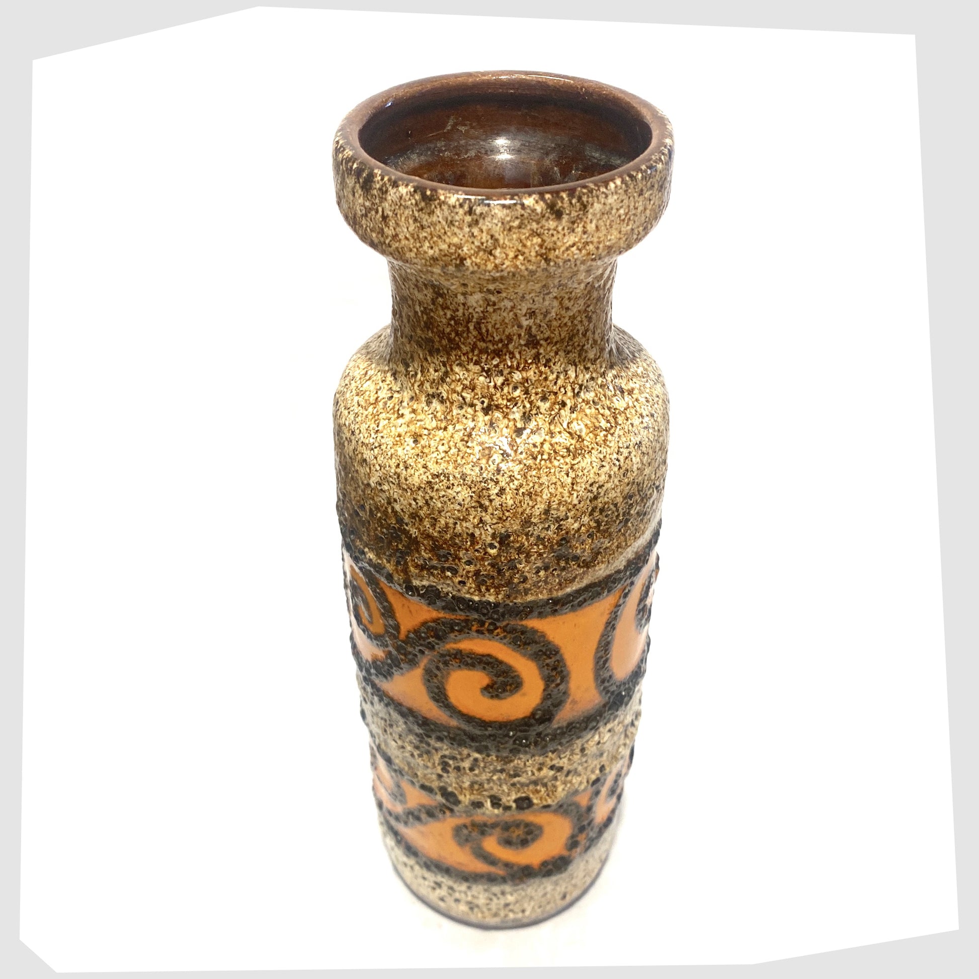 top rim of the Scheurich Keramik 200-28 Vase with bands of orange and black swirls frames in deep fat lava glaze