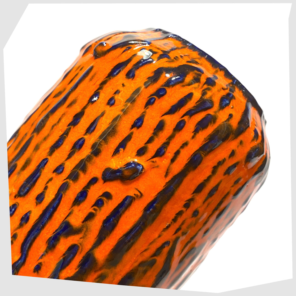 Close up of the Scheurich Keramik 238-14 Vase, part of Scheurich's 'Europ Linie' collection, in a vivid orange and blue fat lava glaze, shown on a white background