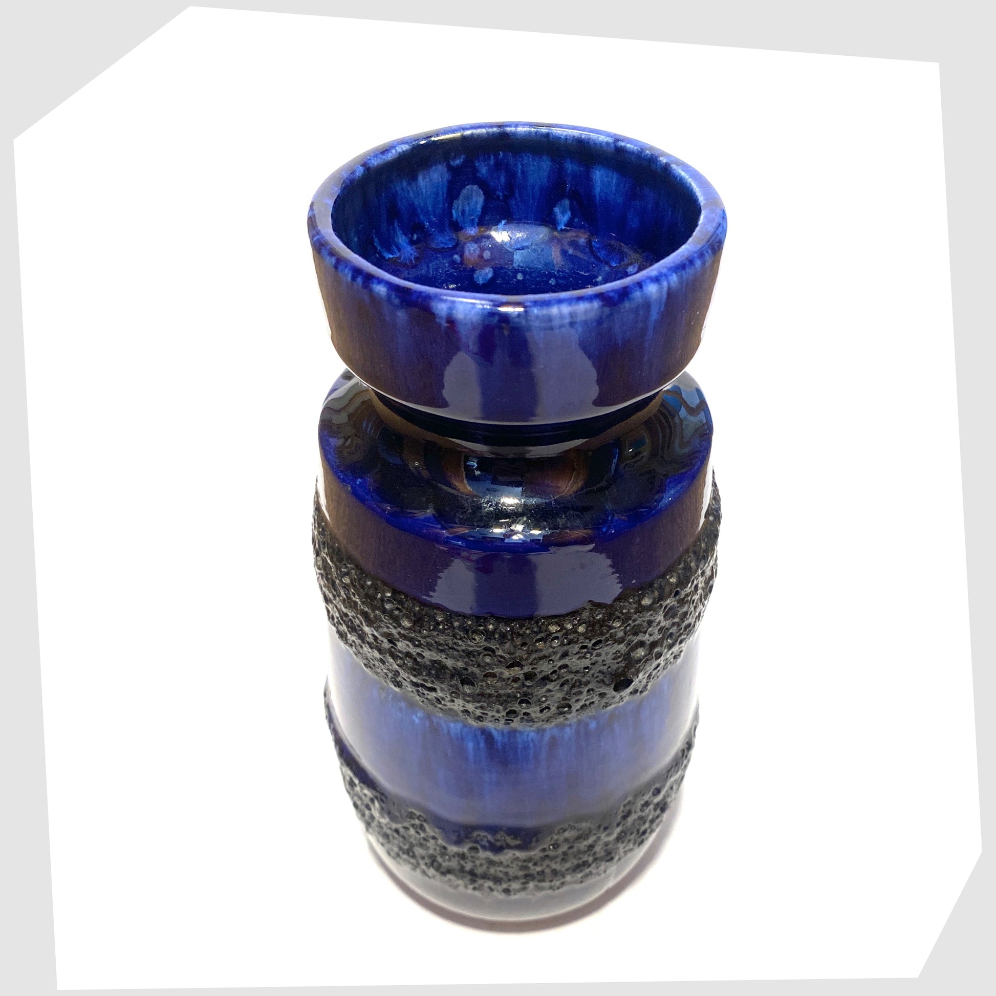 top of the Scheurich Keramik 242-22 Vase in a rich blue glaze with bands of black fat lava