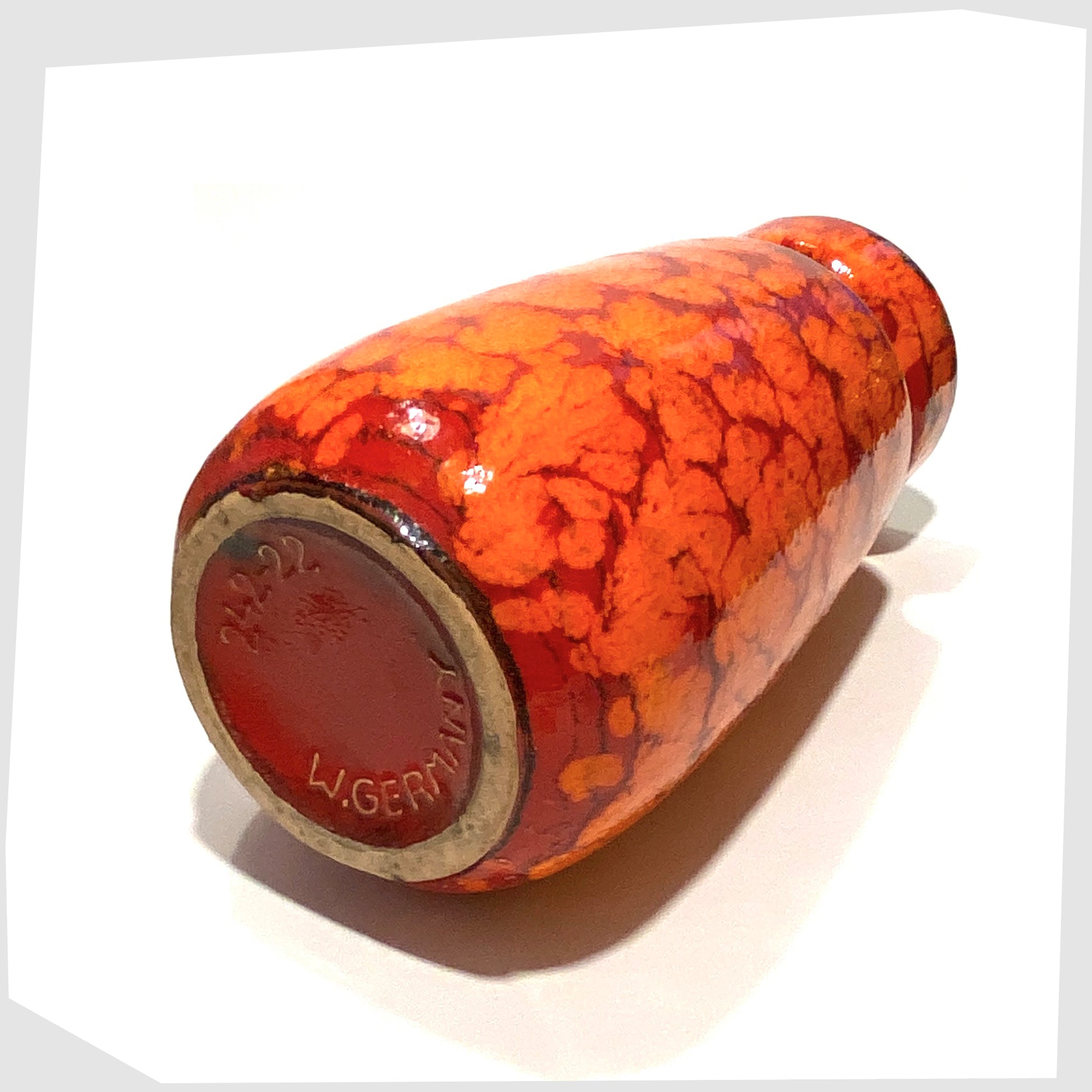 base of the Scheurich Keramik 242-22 Vase in a Orange and Red Fire glaze