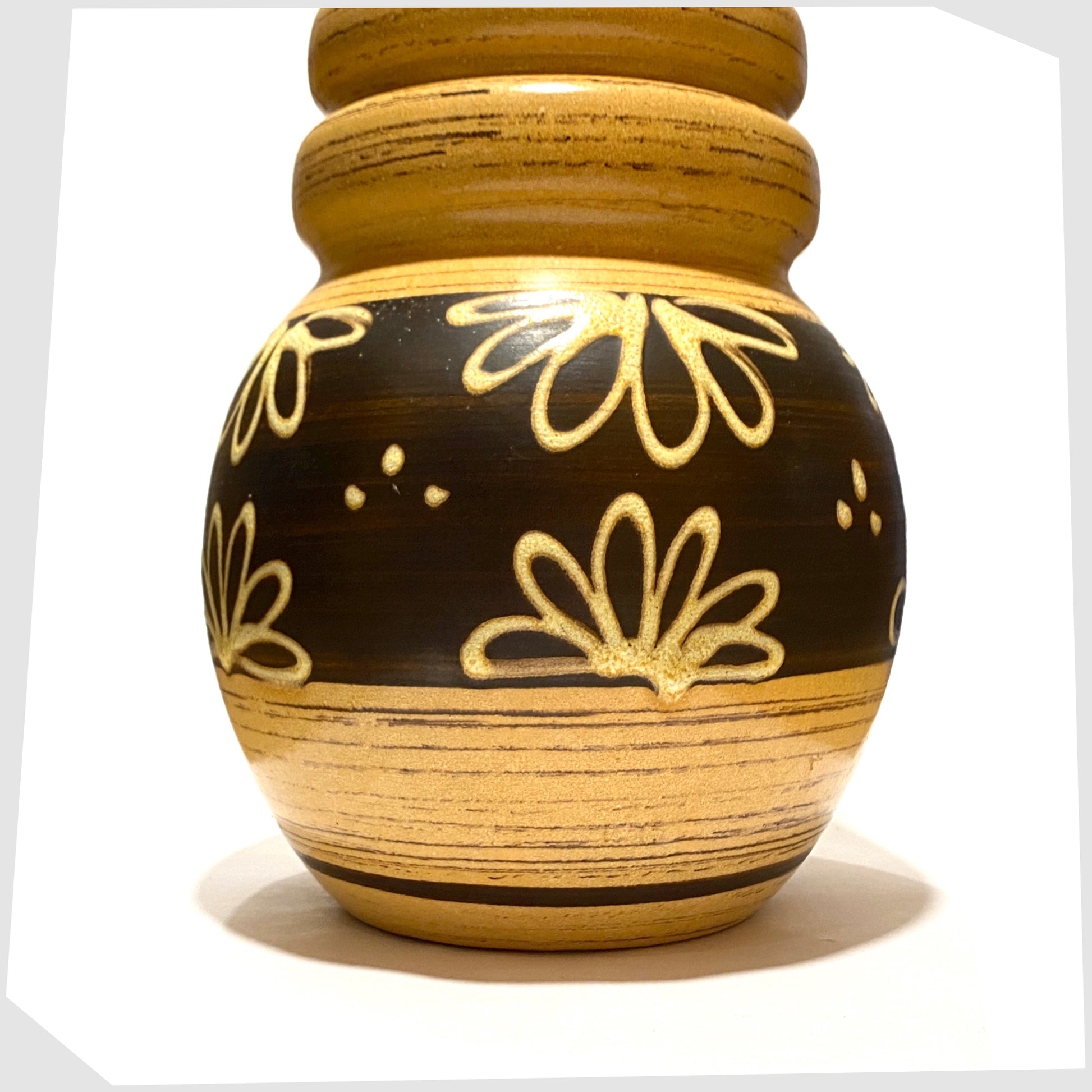 ball shaped base of the west german pottery floor vase by scheurich keramik model-269-40 in a yellow/beige and brown glaze with floral design