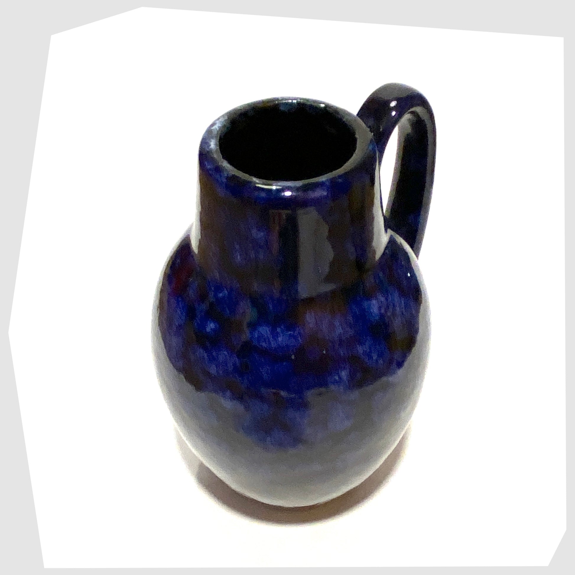 top rim of the Scheurich Keramik 414-16 Vase in navy and blue mottled glaze