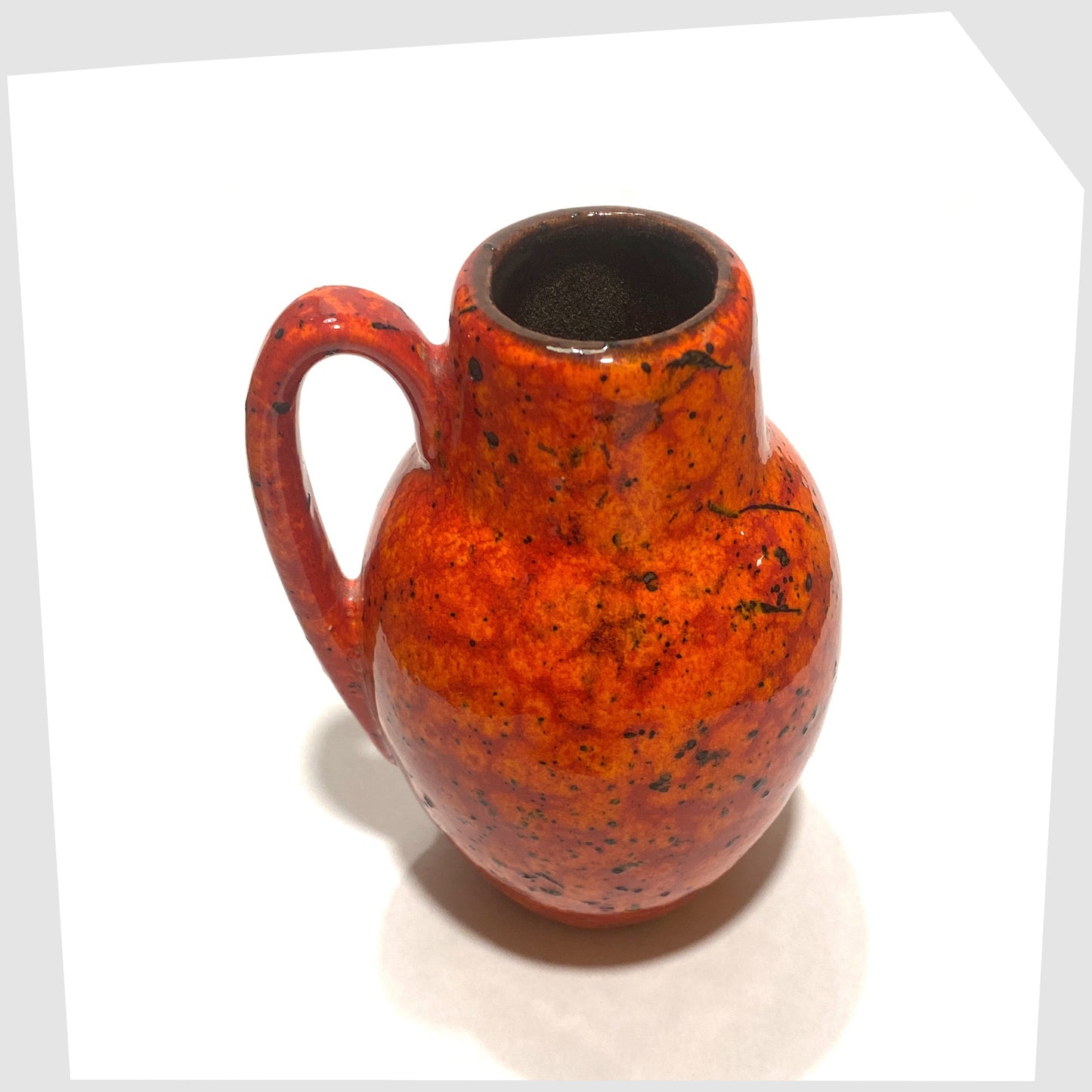 top rim of the Scheurich Keramik 414-16 Vase in a Fire glaze of orange and red flecks with black speckles