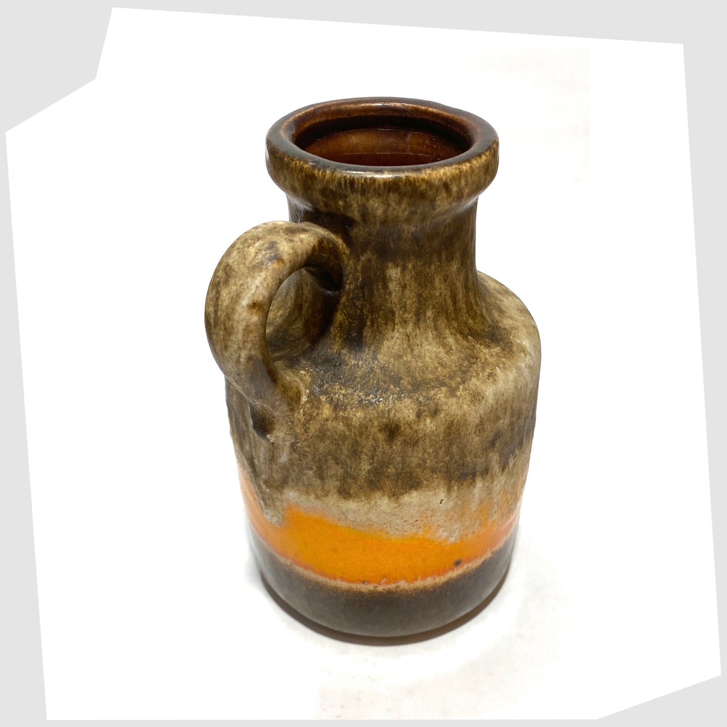 Top rim of the Scheurich Keramik 414-16 Vase in matte fat lava drip glaze with contrasting band of vibrant orange gloss glaze, shown on a white background