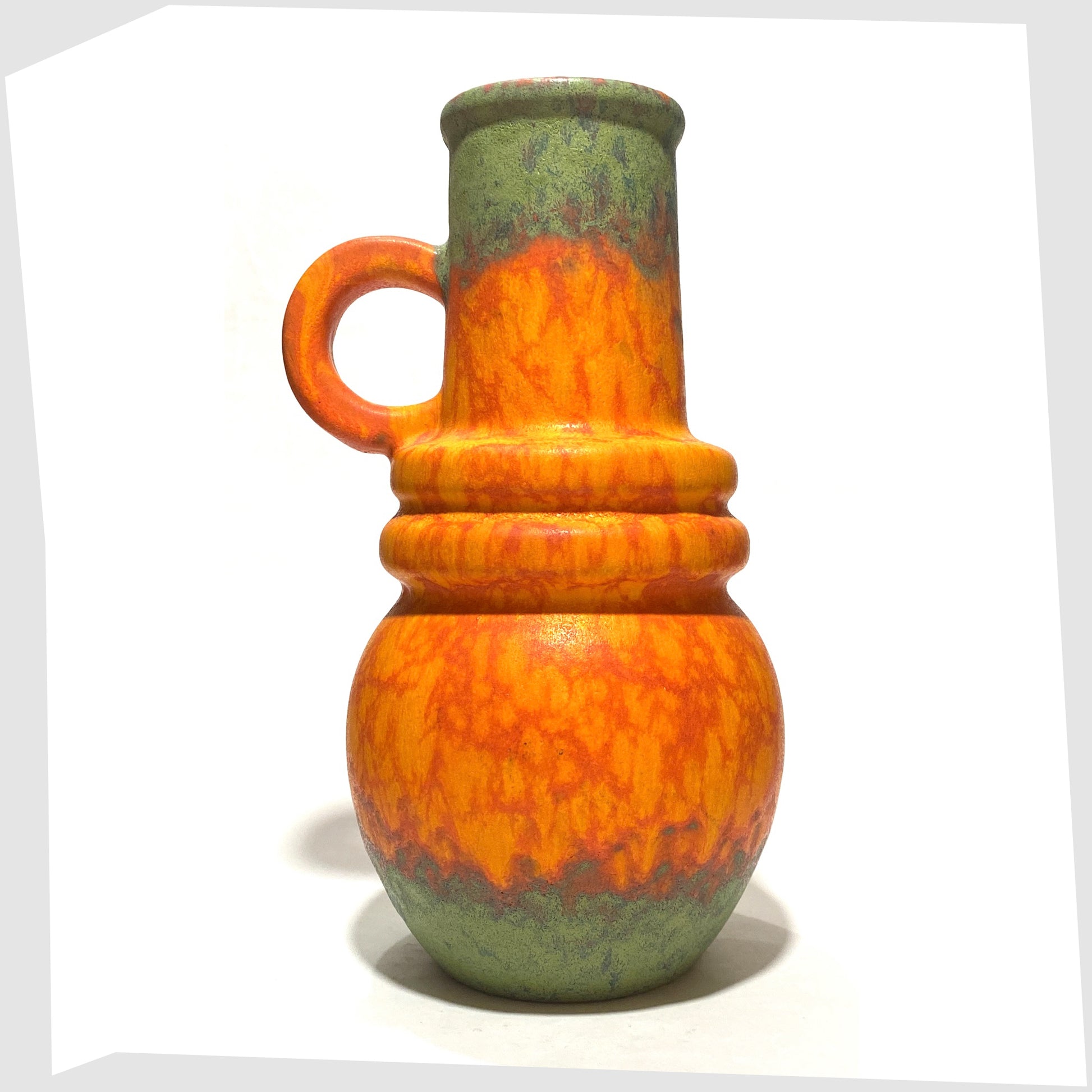 1970s scheurich keramik 428-26 vase finished in a volcanic orange fat lava glaze with vivid matte green