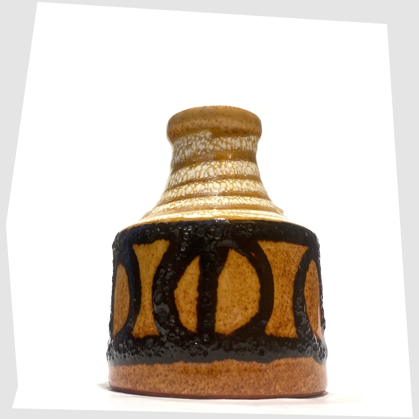 1970s Scheurich Keramik 550-10 Vase in an amber glaze with black fat lava circles and white swirls, shown on a white background