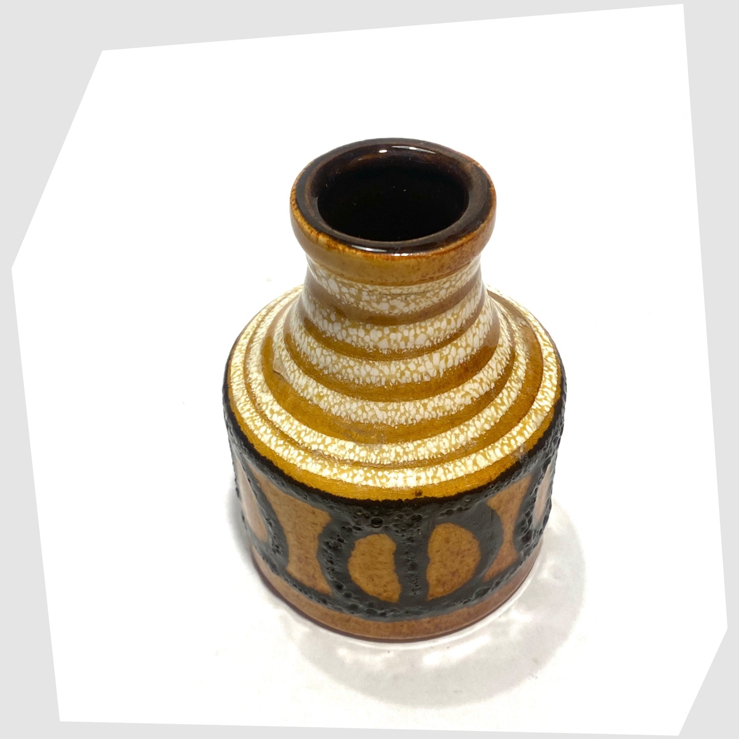 Top rim of the Scheurich Keramik 550-10 Vase in an amber glaze with black fat lava circles and white swirls, shown on a white background