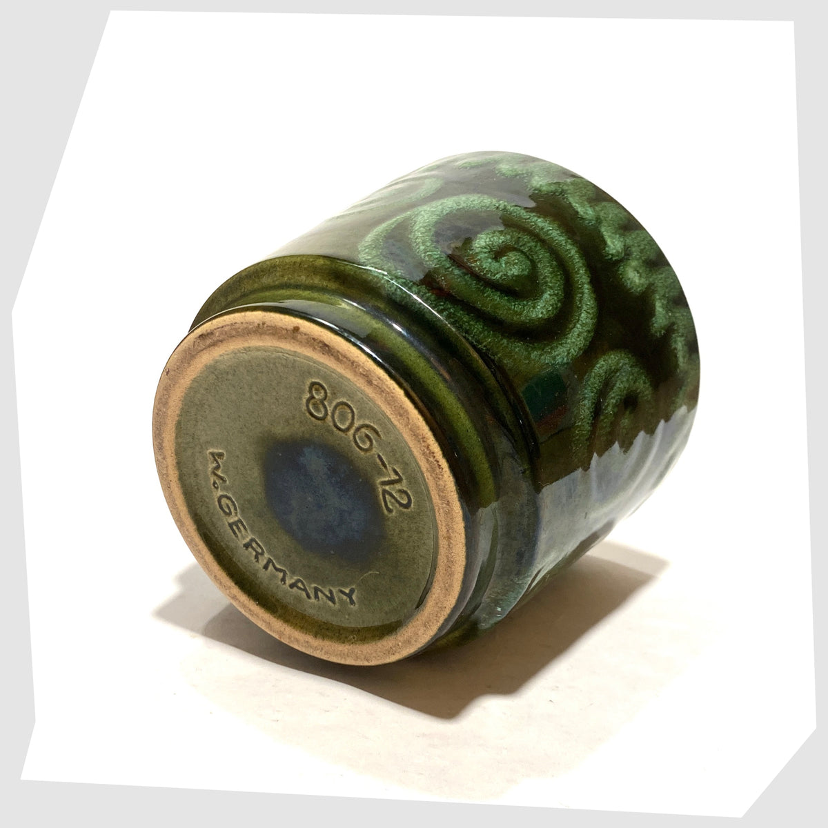 Base of the Scheurich Keramik 806-12 Planter in green swirled glaze, shown on a white background