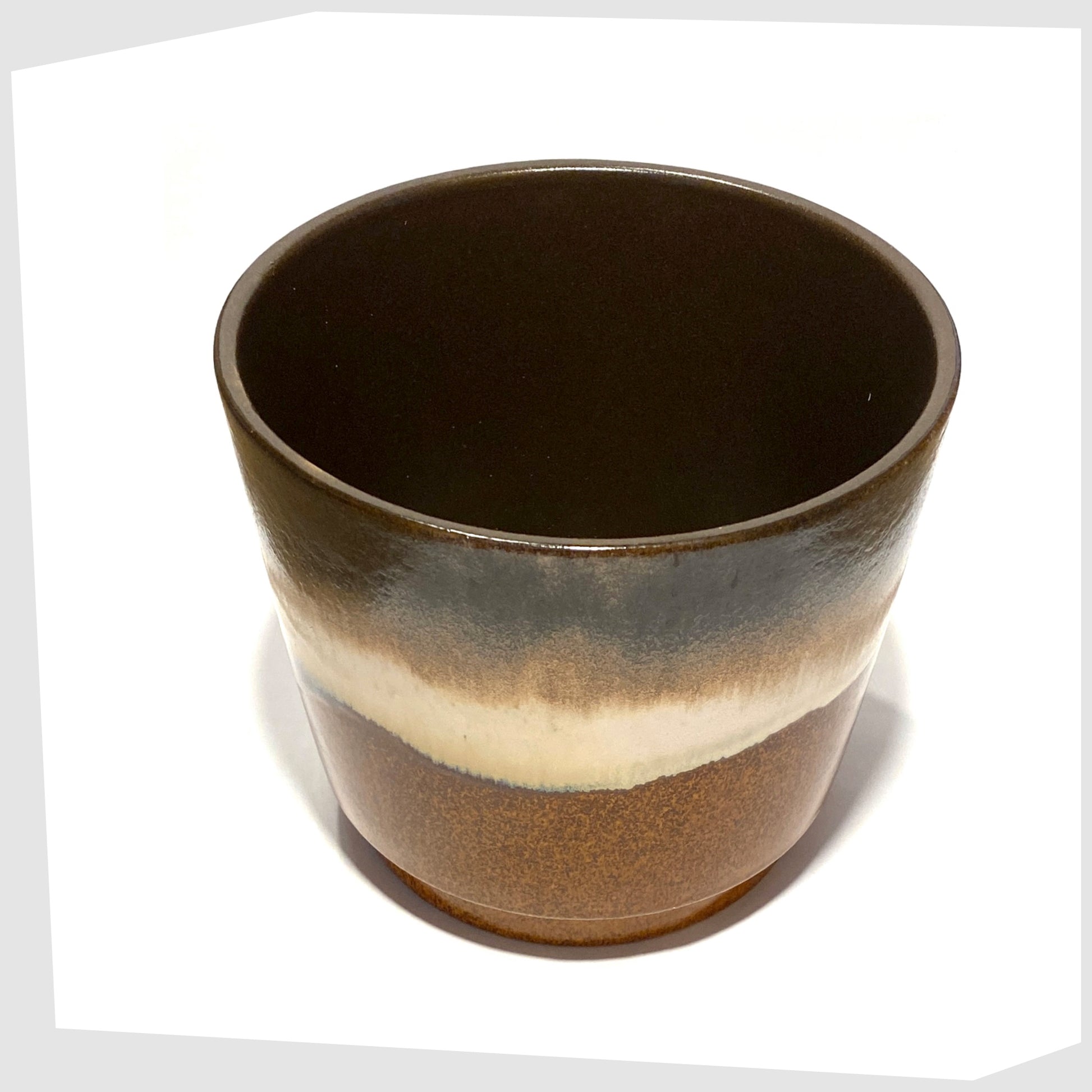 inner glaze on the Large West German Pottery Planter by Scheurich Keramik model 806-19 in a striped glaze of warm grey, brown and cream