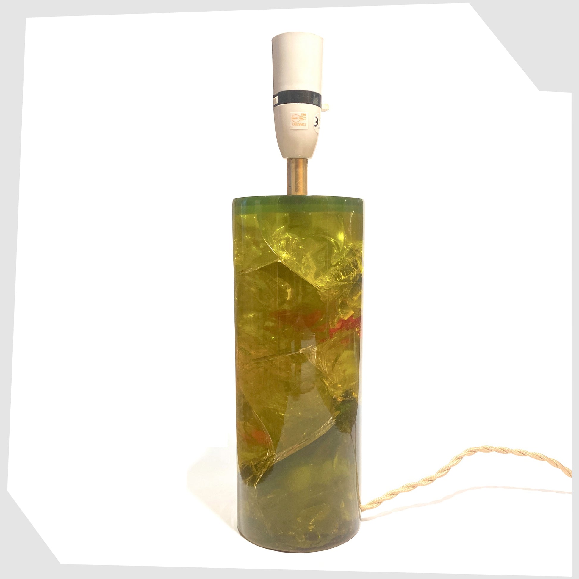 shattaline table lamp base made of chartreuse yellow resin with green and red crystals