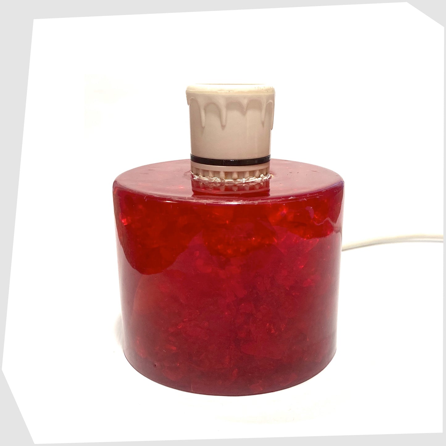 A Red Shattaline Table Lamp with white bulb holder photographed against a plain white background.