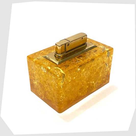Orange Shattaine Table Lighter in rectangular resin with brass fitting