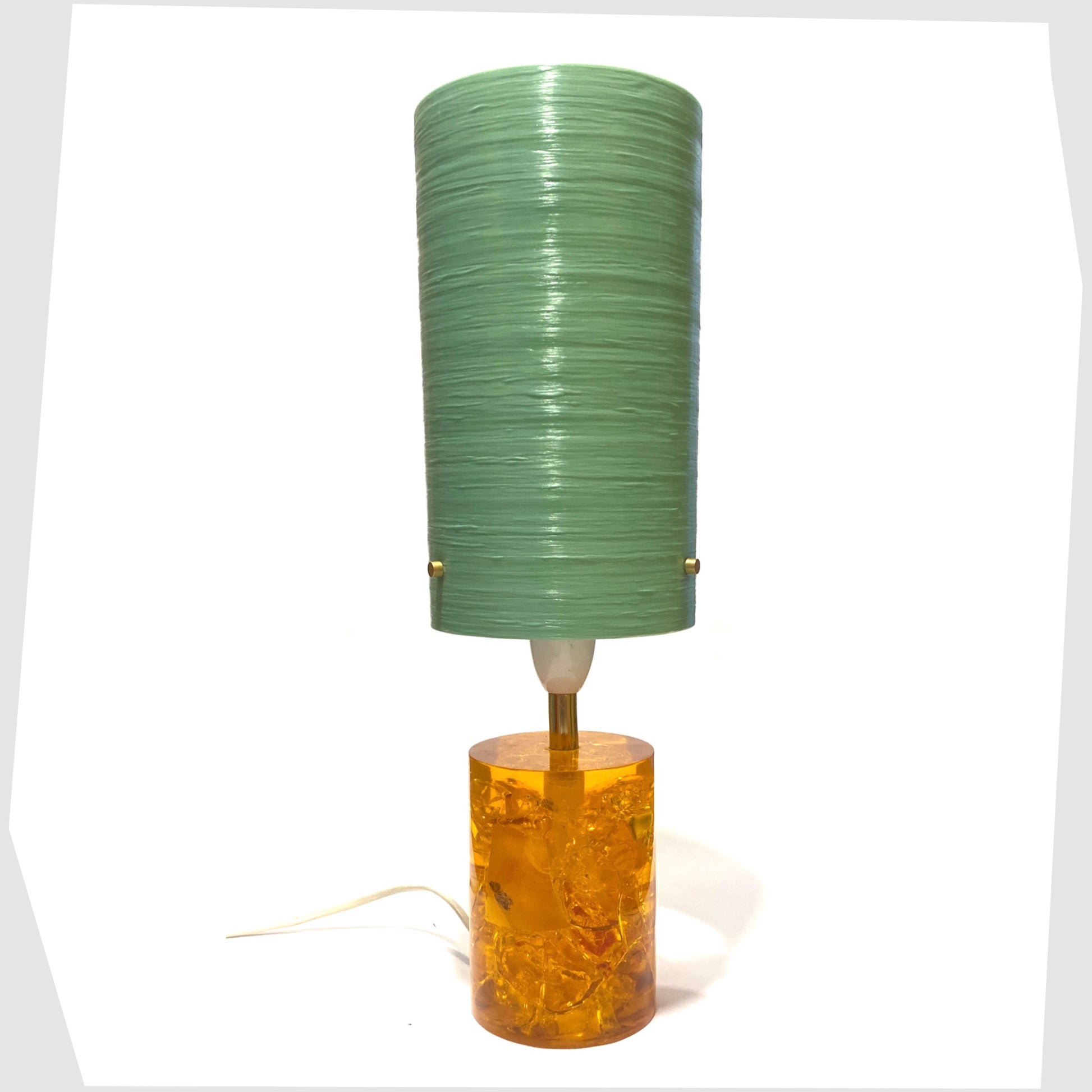 Royplast Spun Fibreglass Lamp Shade in mint green by By Royale, shown on an orange Shattaline table lamp base