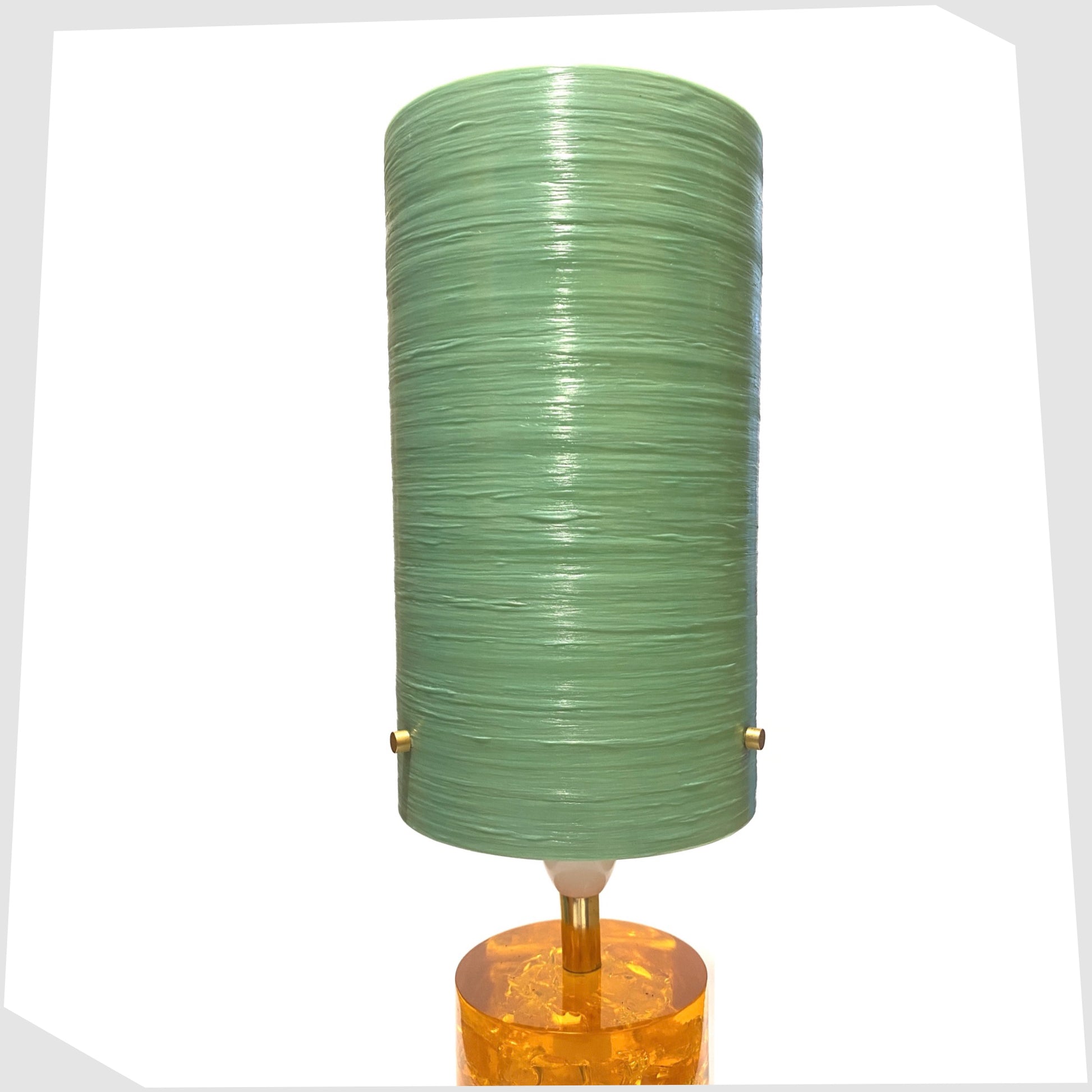 Royplast Spun Fibreglass Lamp Shade in mint green by By Royale, shown on an orange Shattaline lamp