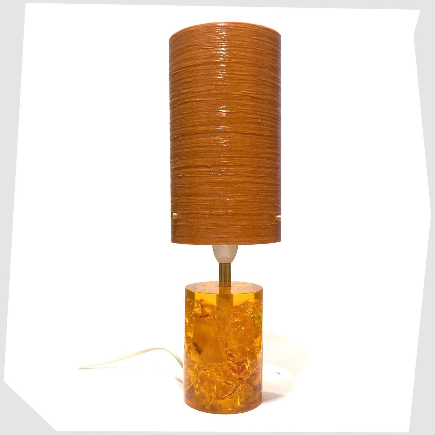 Royplast Spun Fibreglass in Orange colourway by By Royale, show on an orange Shattaline table lamp base