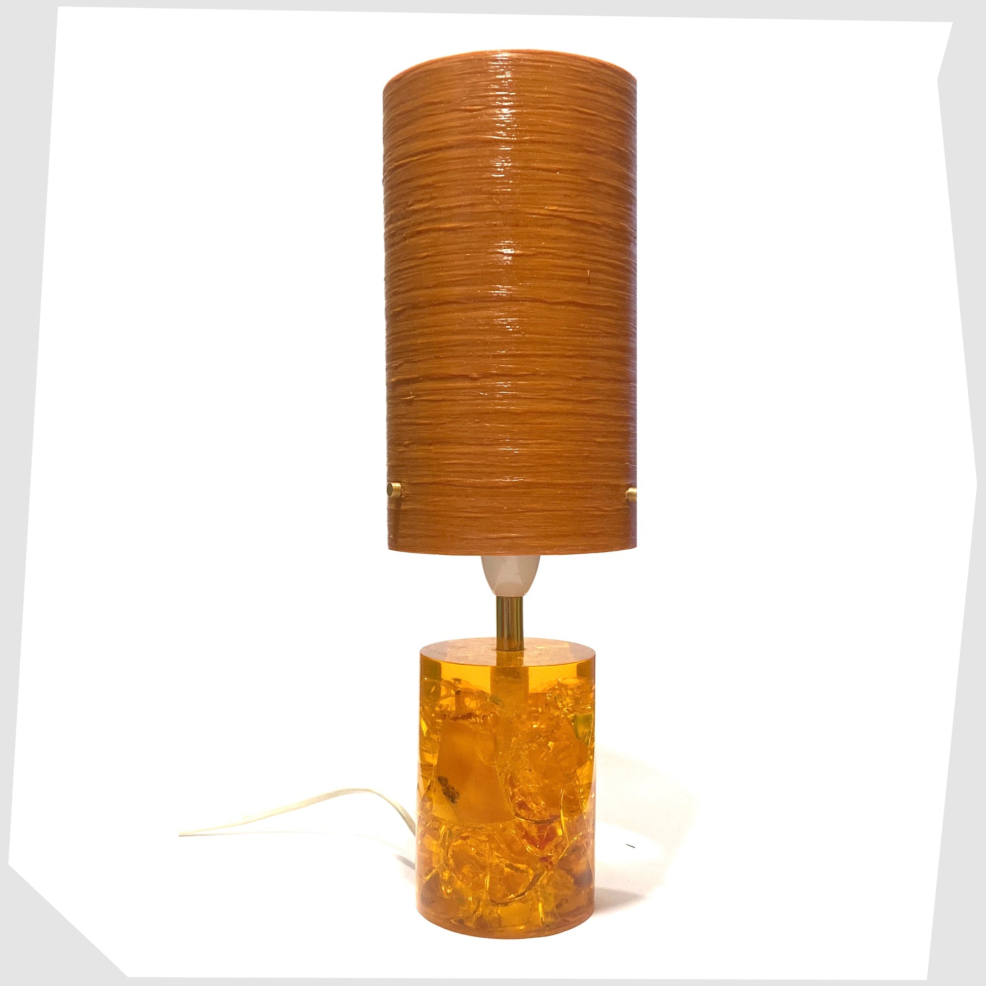 Royplast Spun Fibreglass in Orange colourway by By Royale, show on an orange Shattaline table lamp base