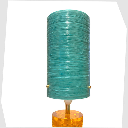 Royplast Spun Fibgreglass Lamp Shade in Turquoise by By Royale, shown on an orange Shattaline lamp