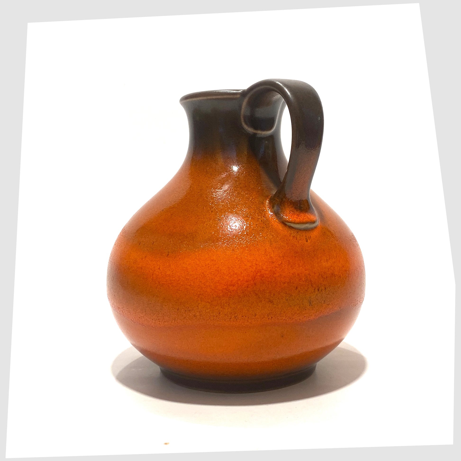 1970s West German Steuler Keramik 515/15 Vase in a vibrant orange fat lava glaze