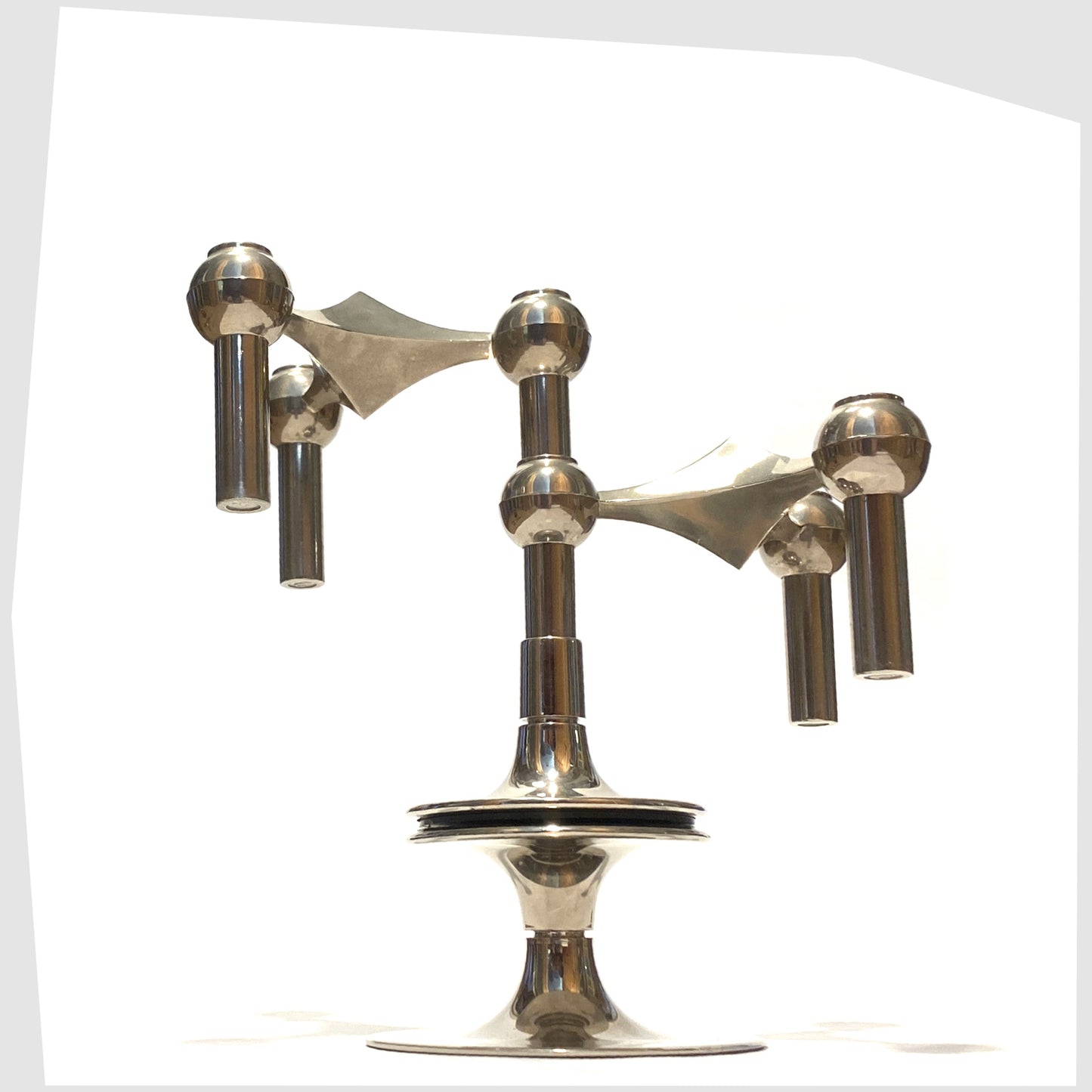 stoff nagel modular candlestick base shown with two candleholders attached