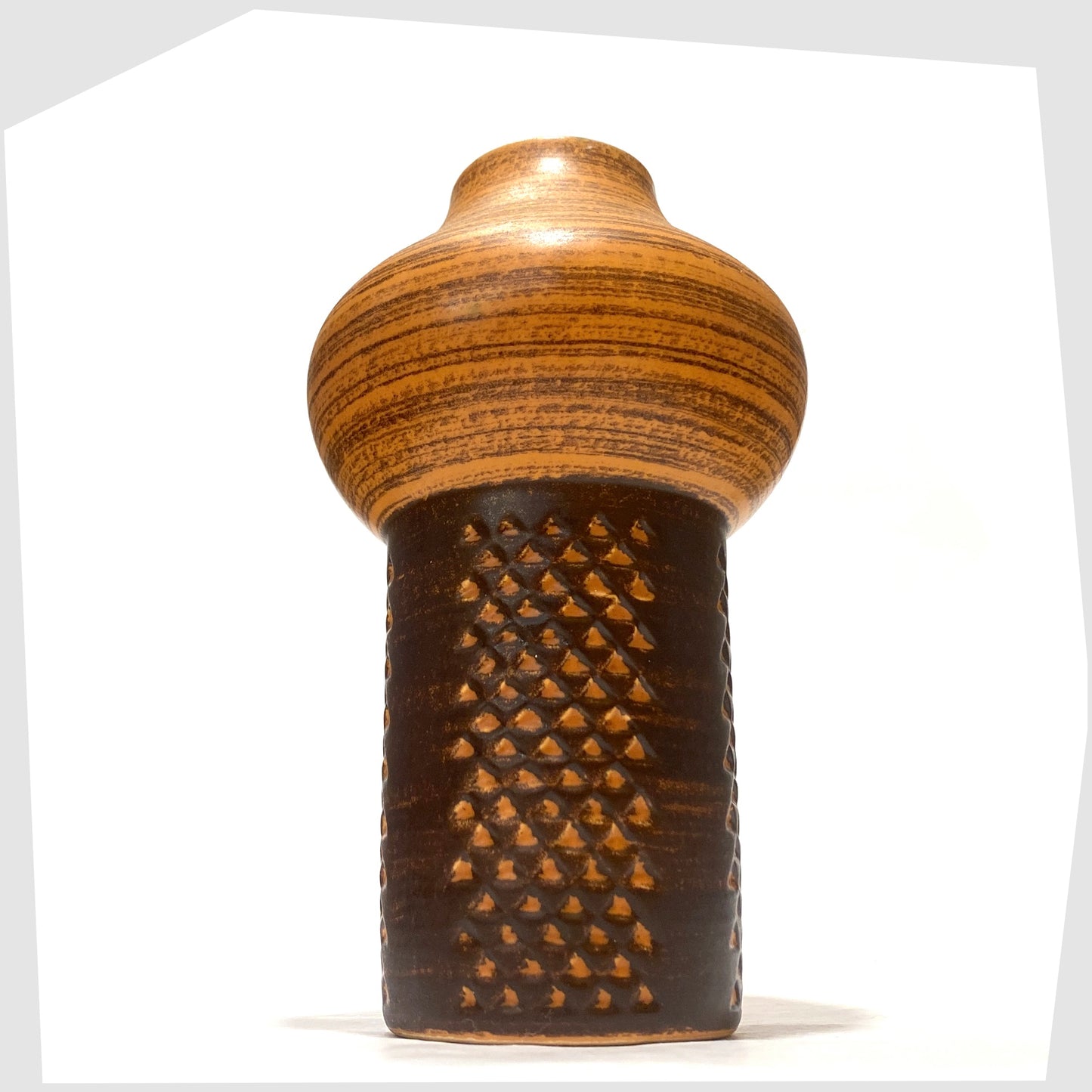 Strehla Keramik 1180 Vase with architectural mushroom form in burnt orange glaze with artistic geometric pattern, shown on a white background