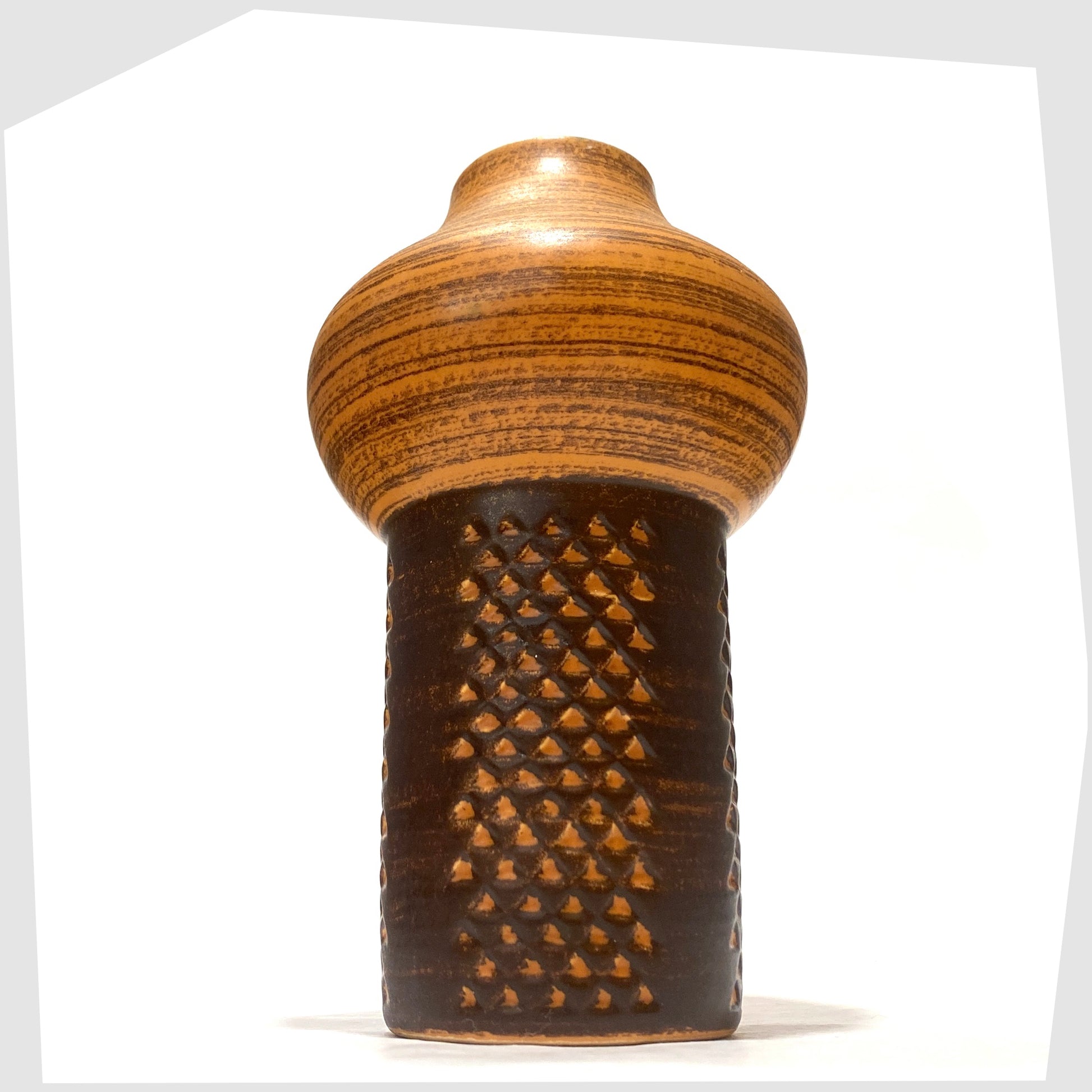 Strehla Keramik 1180 Vase with architectural mushroom form in burnt orange glaze with artistic geometric pattern, shown on a white background