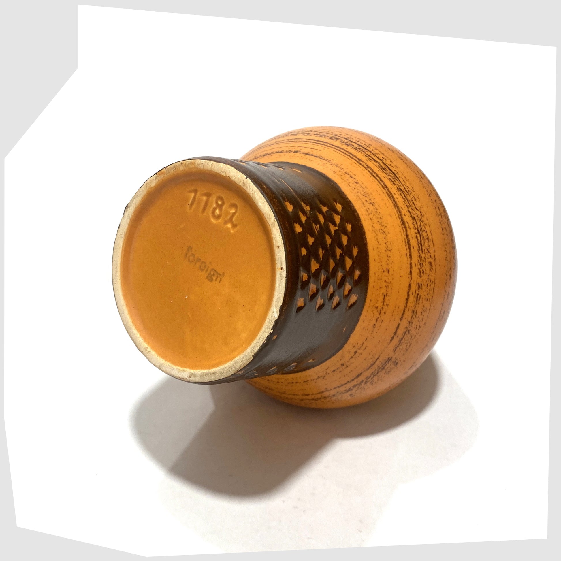 Base markings of the Strehla Keramik 1182 Vase with a bold architectural form in burnt range and chestnut brown glaze, shown on a white background