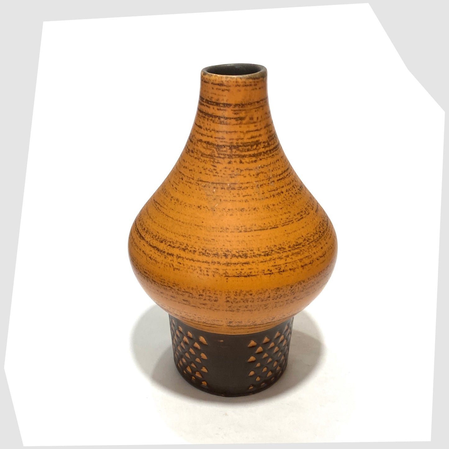 Top rim of the Strehla Keramik 1182 Vase with a bold architectural form in burnt range and chestnut brown glaze, shown on a white background
