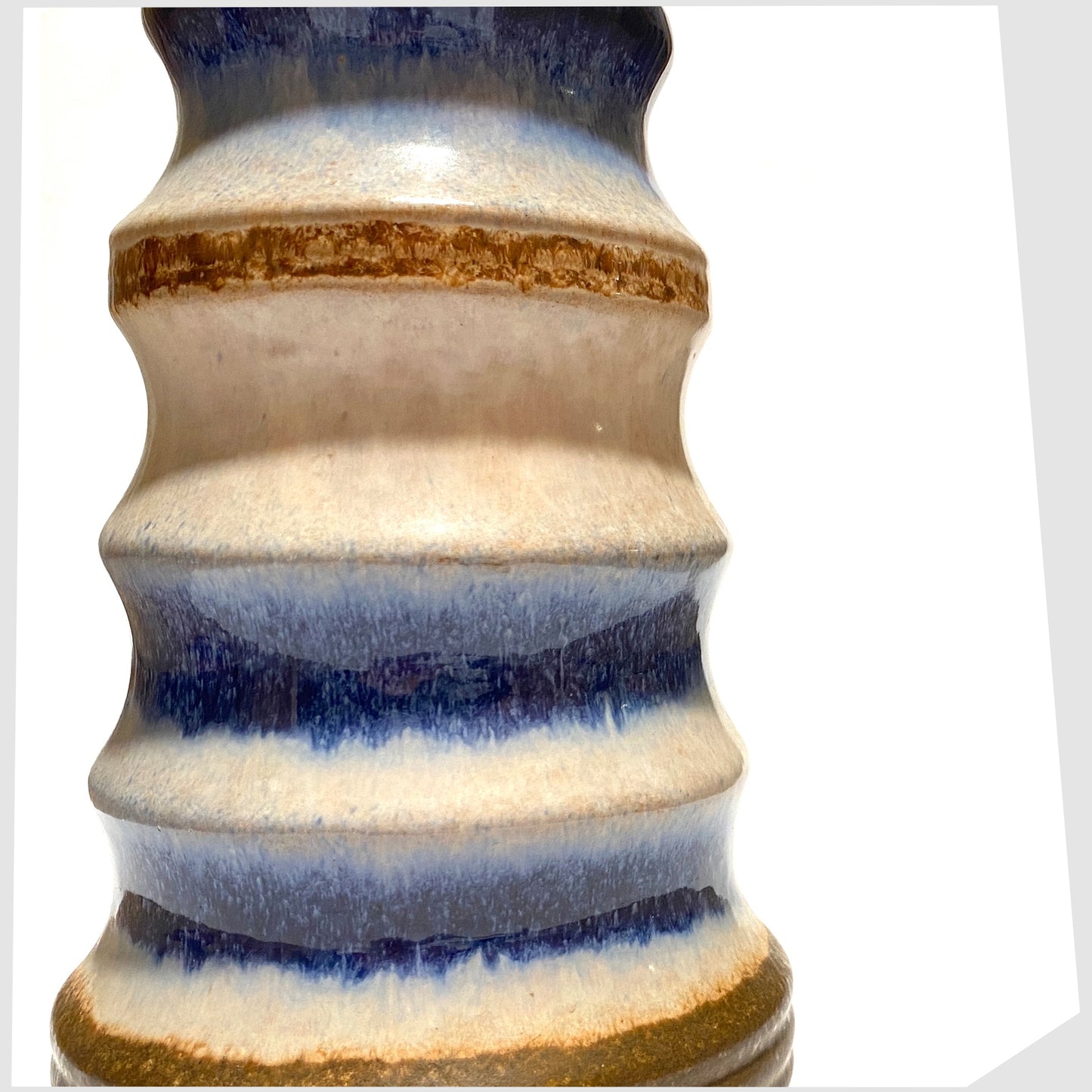 close up of the vintage Strehla Keramik Pagoda Vase finished in rings of white, blue and brown glaze