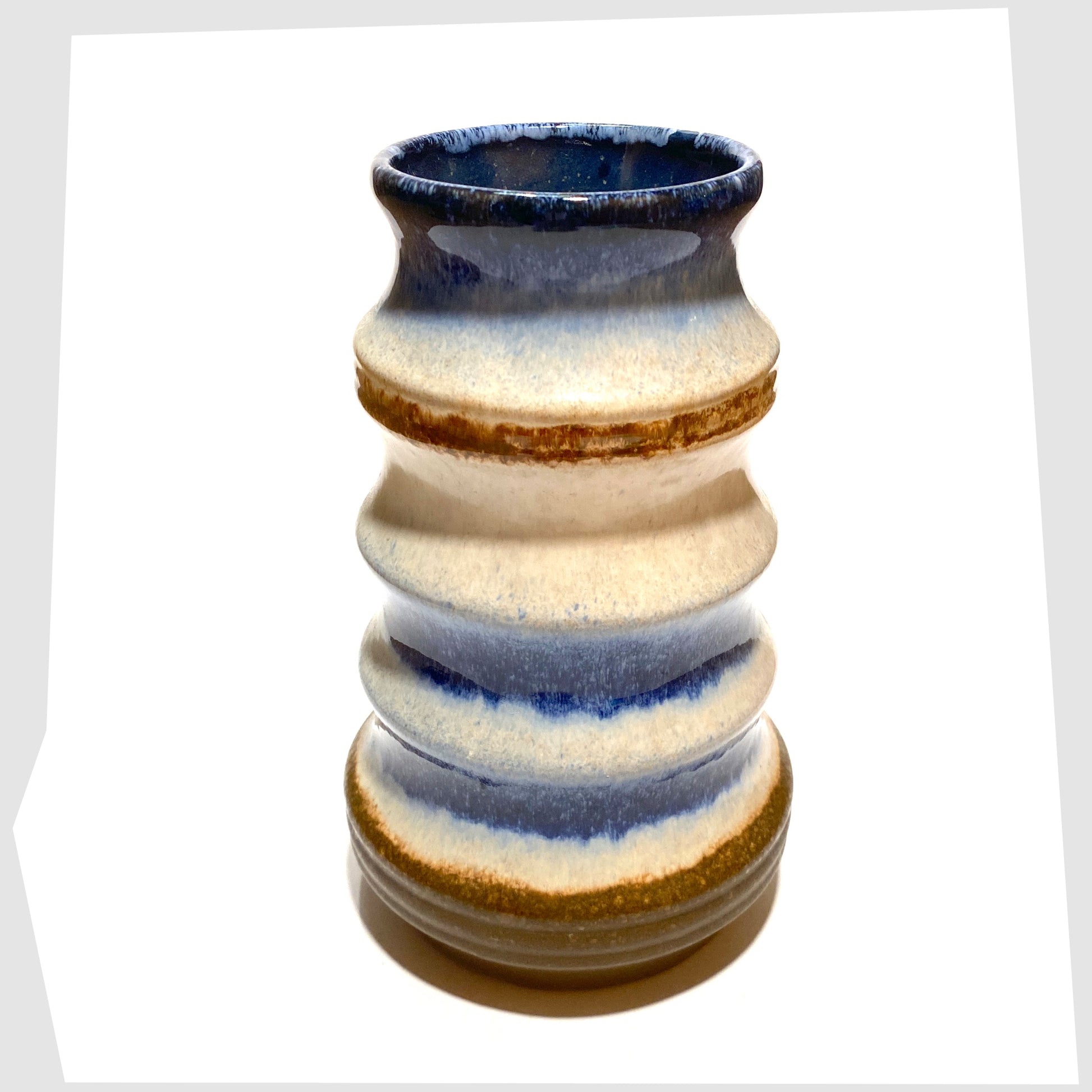 top rim of the vintage Strehla Keramik Pagoda Vase finished in rings of white, blue and brown glaze
