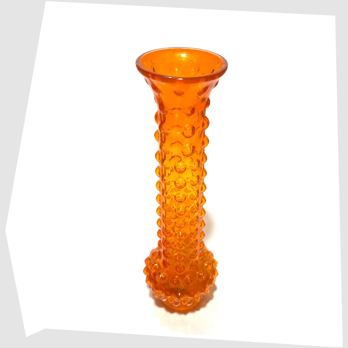 Top rim of the Tajima Japanese Orange Cased Glass Vase with repeating knobbly design, shown on a white background