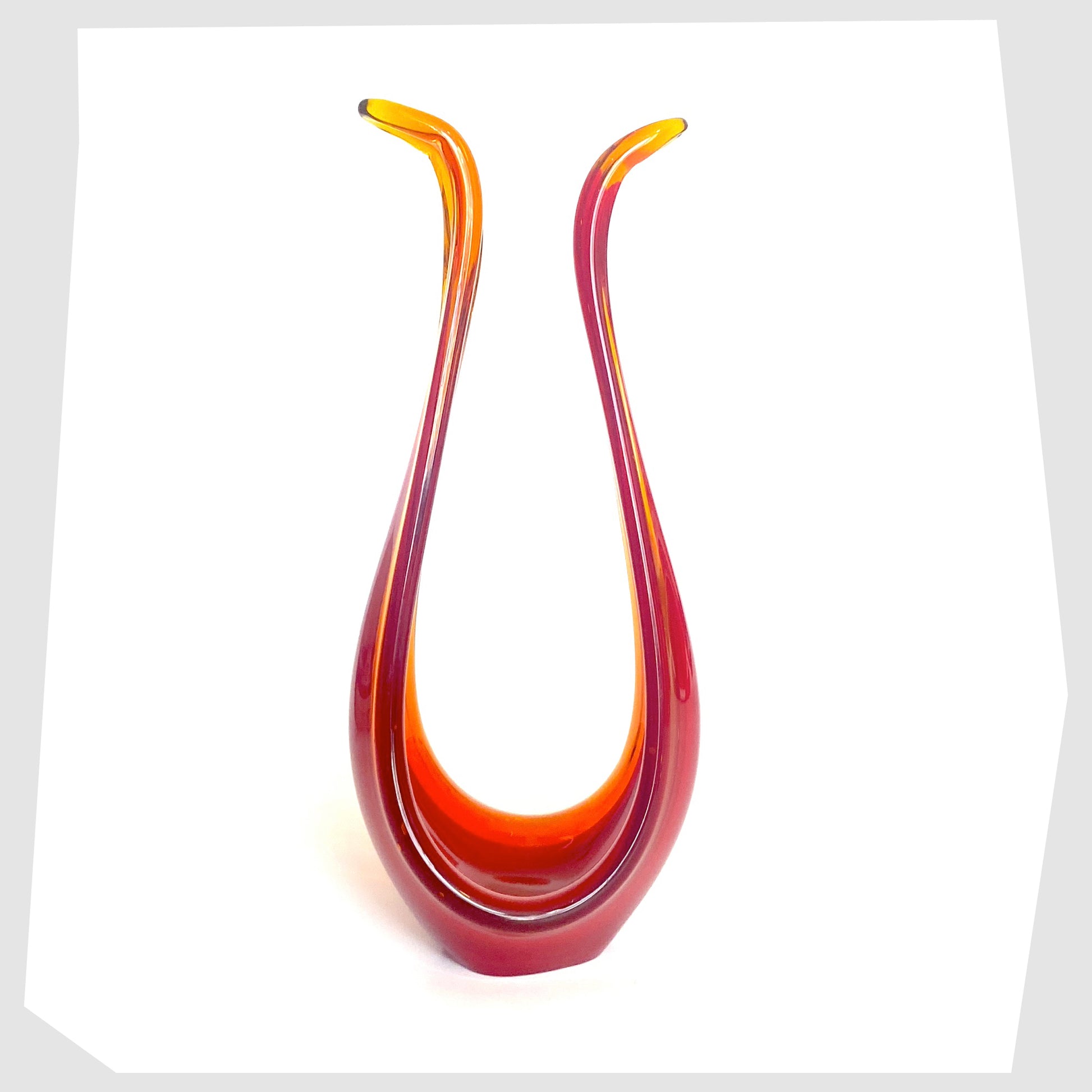 red-and-orange-glass-ornament-made-from-selenium-glass