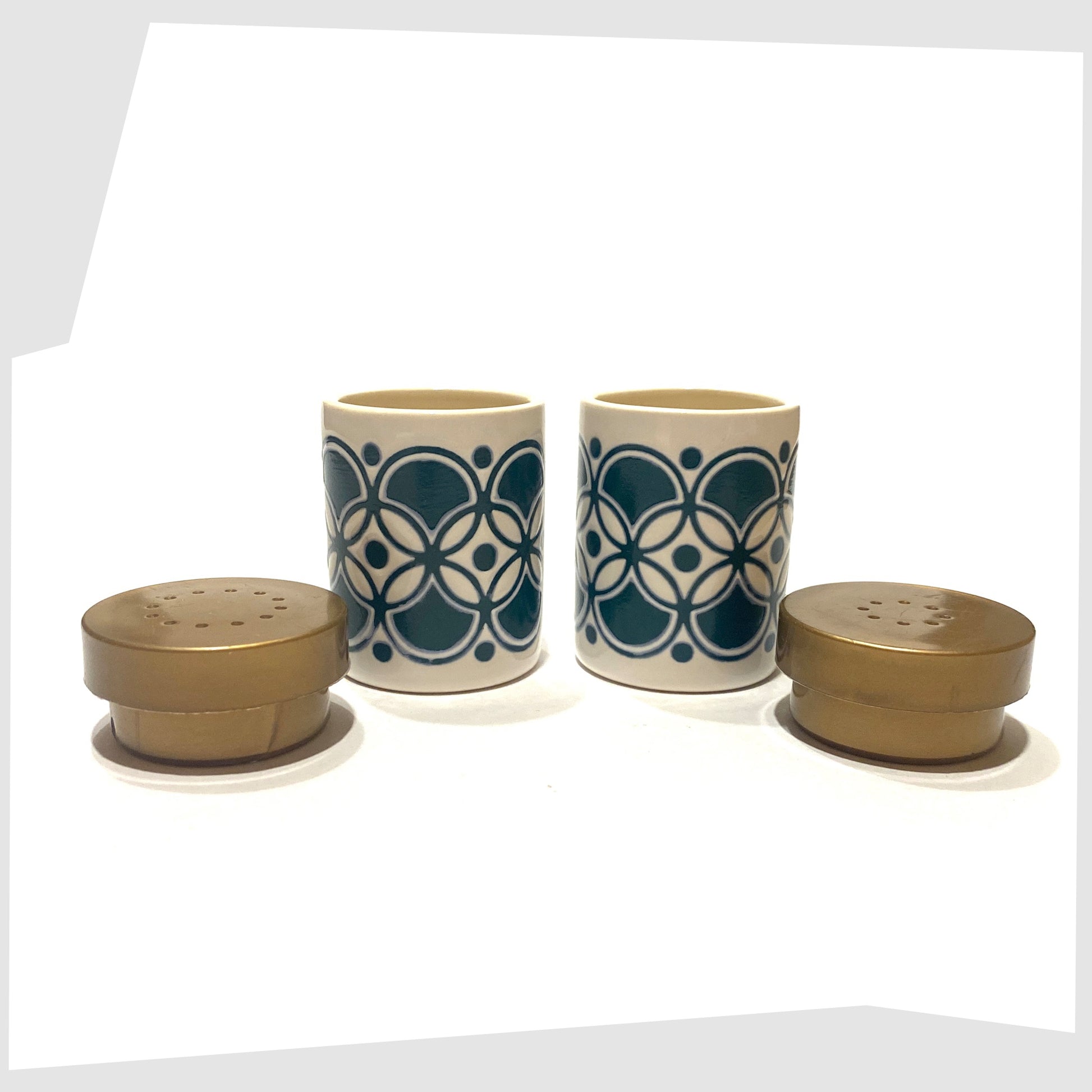 vintage hornsea pottery salt and pepper set in white with teal geometric pattern with lids removed