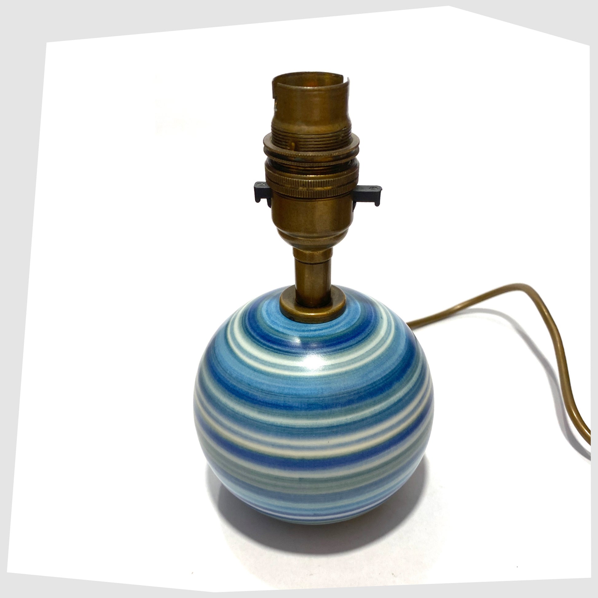 1970s hand-painted Jersey Pottery Spherical Table Lamp, shown on a white background
