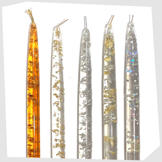 vintage nachtmann lucite candles in orange and clear acrylic lucite with various metal flecks