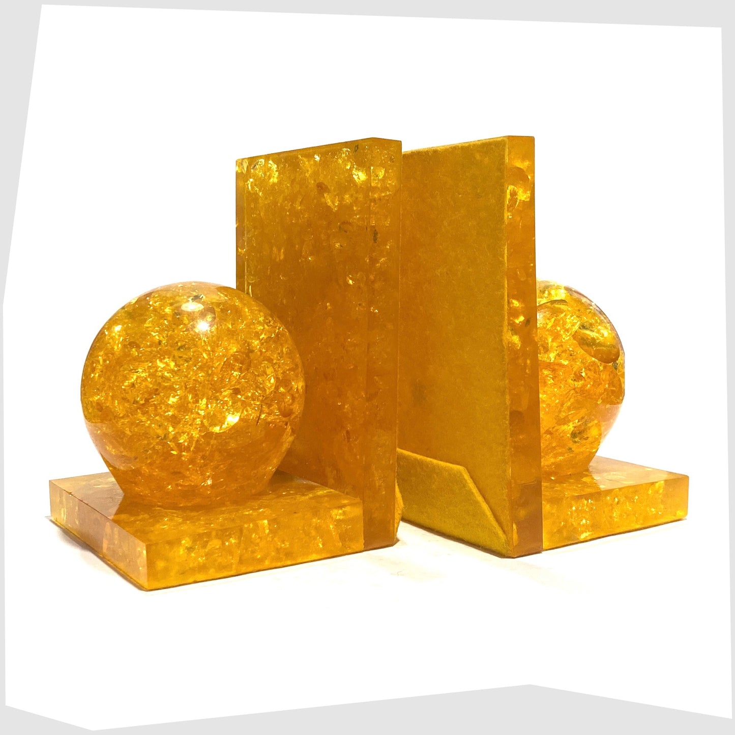 Pair of mid-century modern Shattaline Bookends in orange resin
