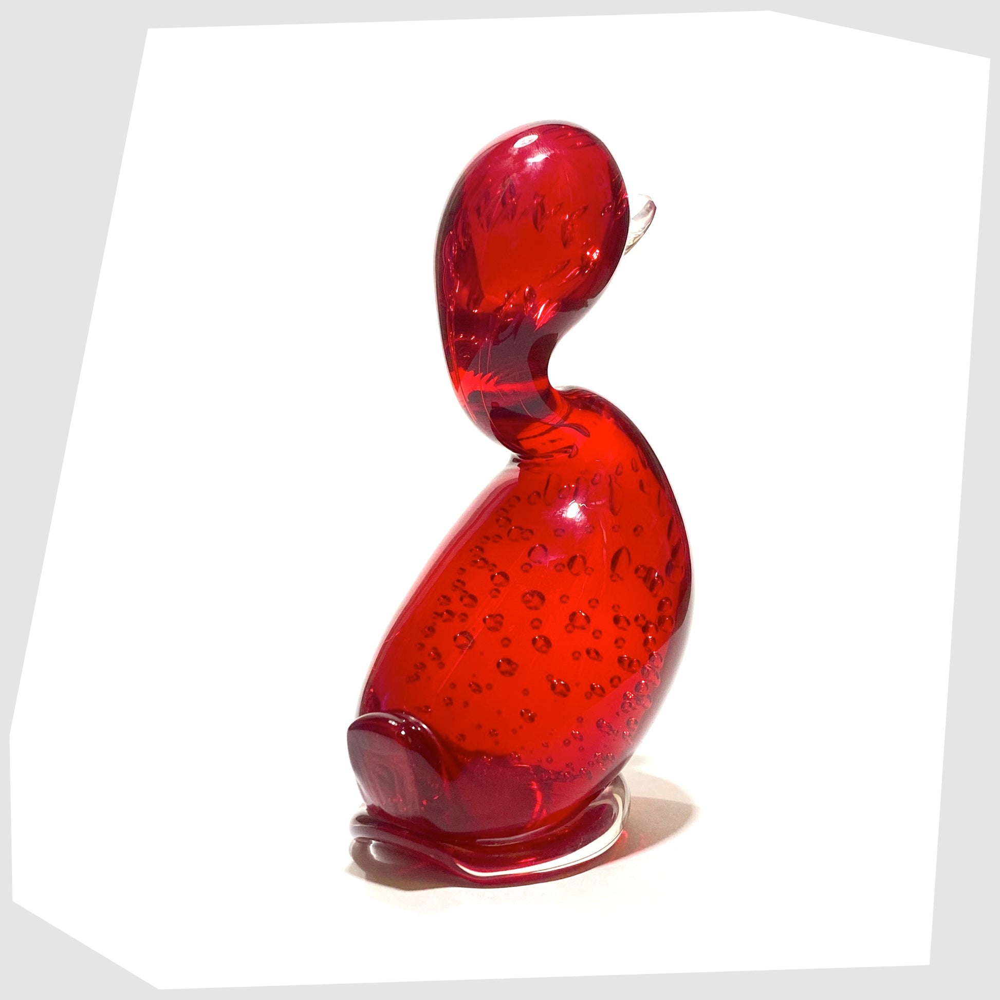 rear of the whitefriars glass dilly duck ornament in ruby red glass with controlled bubbles