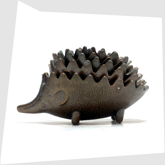 Walter Bosse style Hedgehog Ashtray Set, shown stacked on a white background