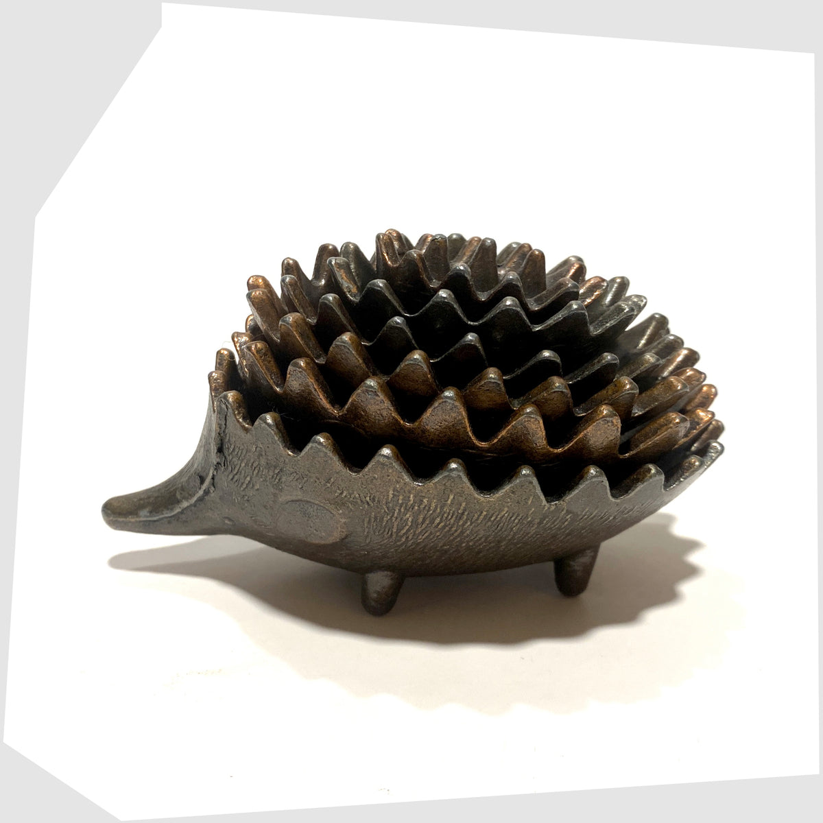 Walter Bosse style Hedgehog Ashtray Set, made in Greece, shown stacked on a white background