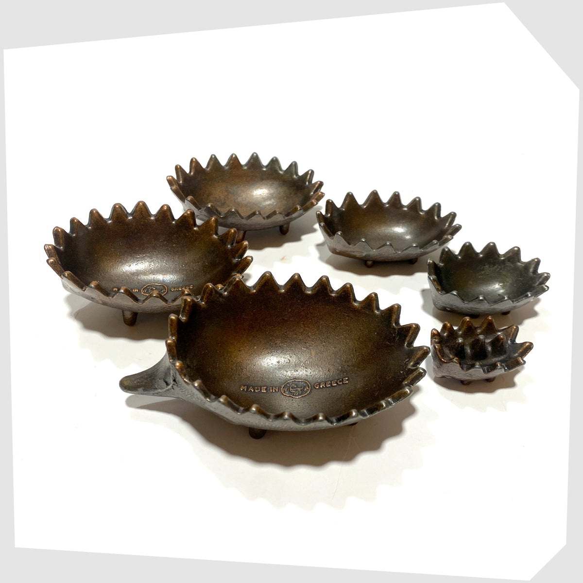 Vintage Walter Bosse style Hedgehog Ashtray Set, shown stacked on a white background