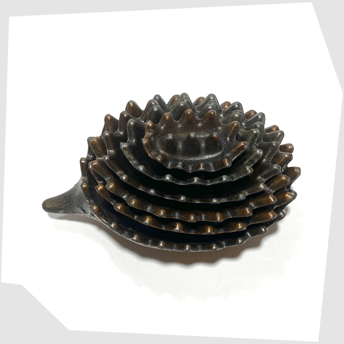 Top of the Walter Bosse style Hedgehog Ashtray Set, shown stacked on a white background