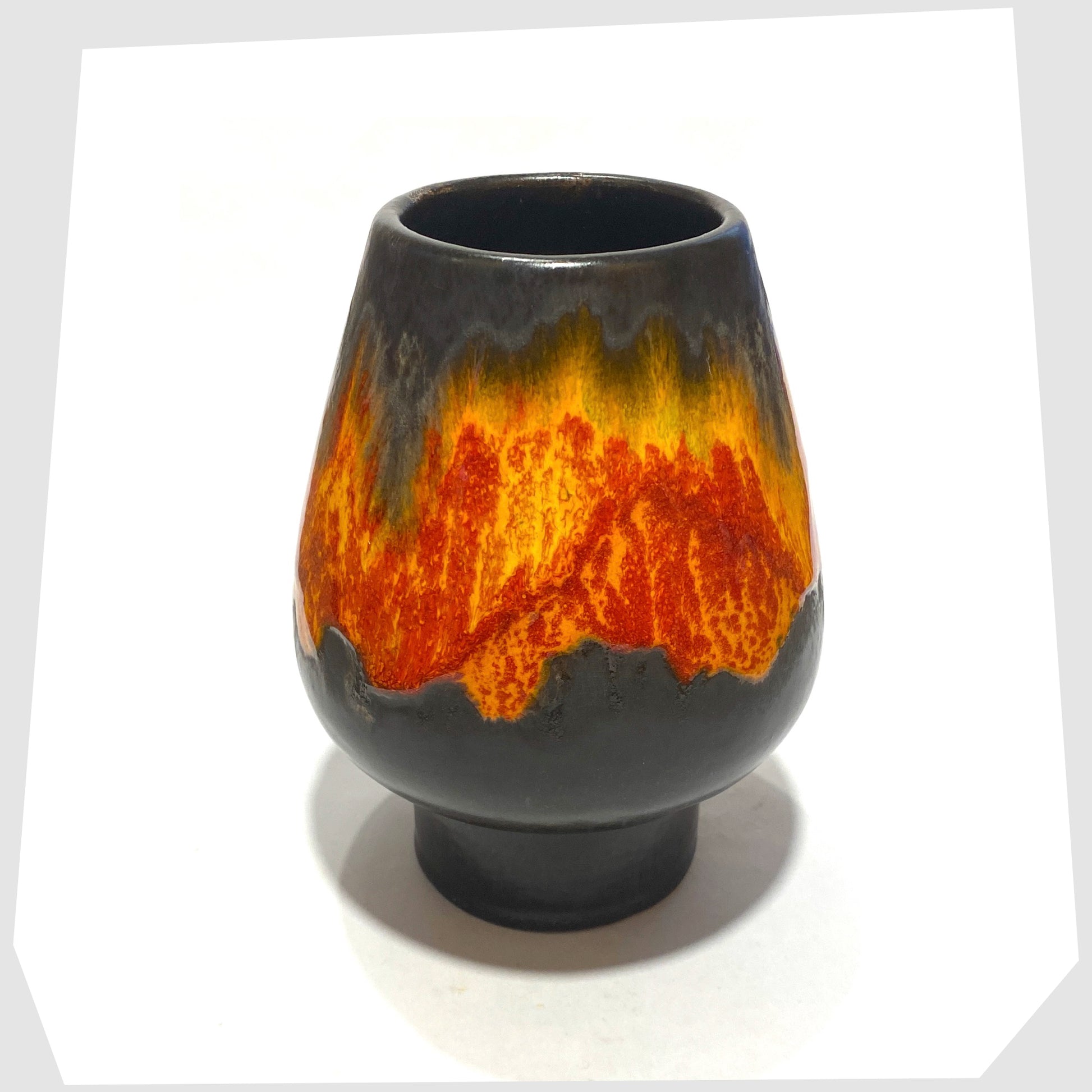 top rim of the walter gerhards 510/15 mushroom-shaped vase in an orange and red drip glaze