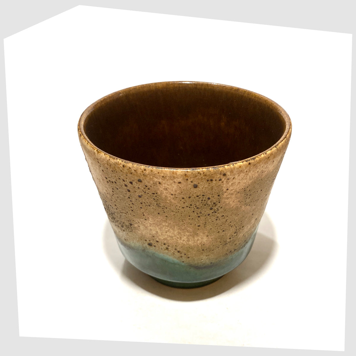 top rim of the West German Pottery Planter finished in green glaze with cascading matte fat lava glaze, shown on a white background