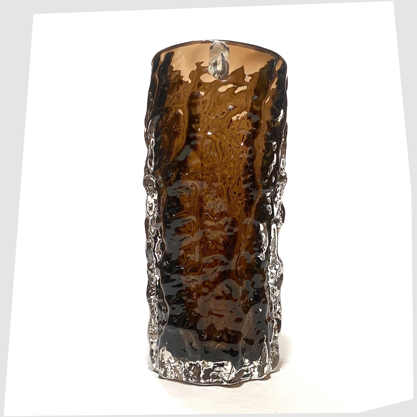 Whitefriars Glass Bark Vase (pattern 9690), designed by Geoffrey Baxter, finished in a cinnamon colour way with original label attached, shown on a white background