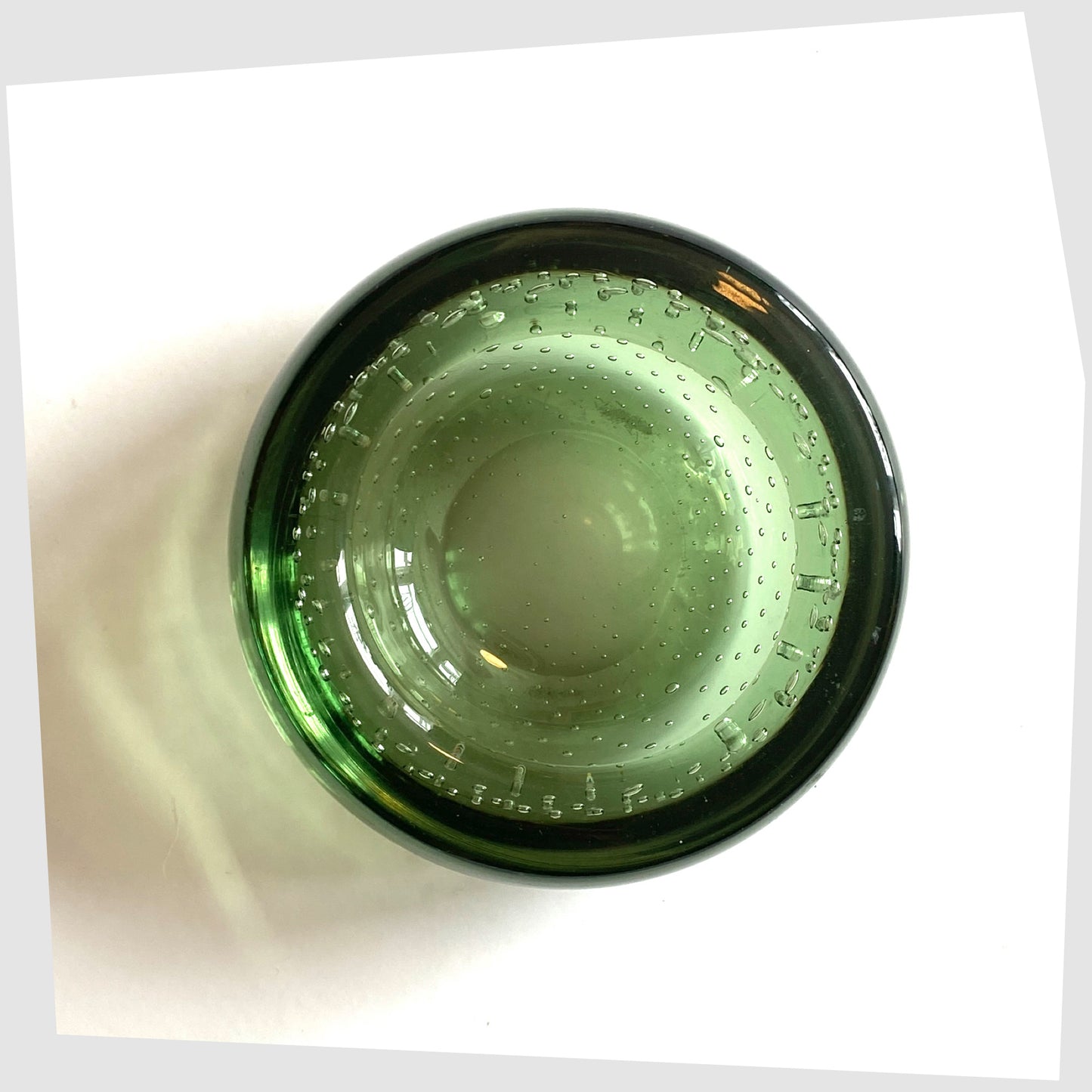 Top view of the Whitefriars Controlled Bubble Dish in Green Glass