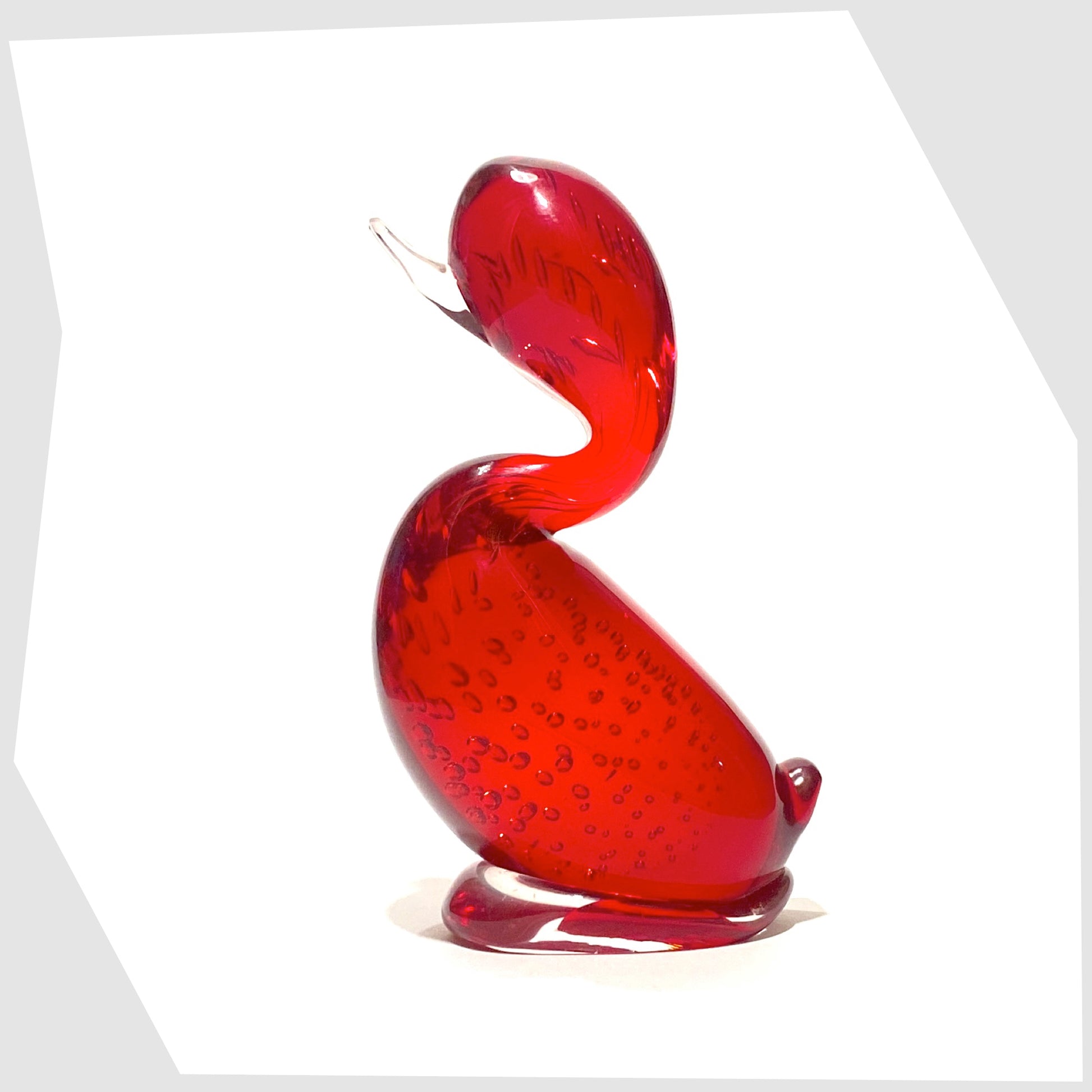 whitefriars glass dilly duck ornament in ruby red glass with controlled bubbles and clear glass beak