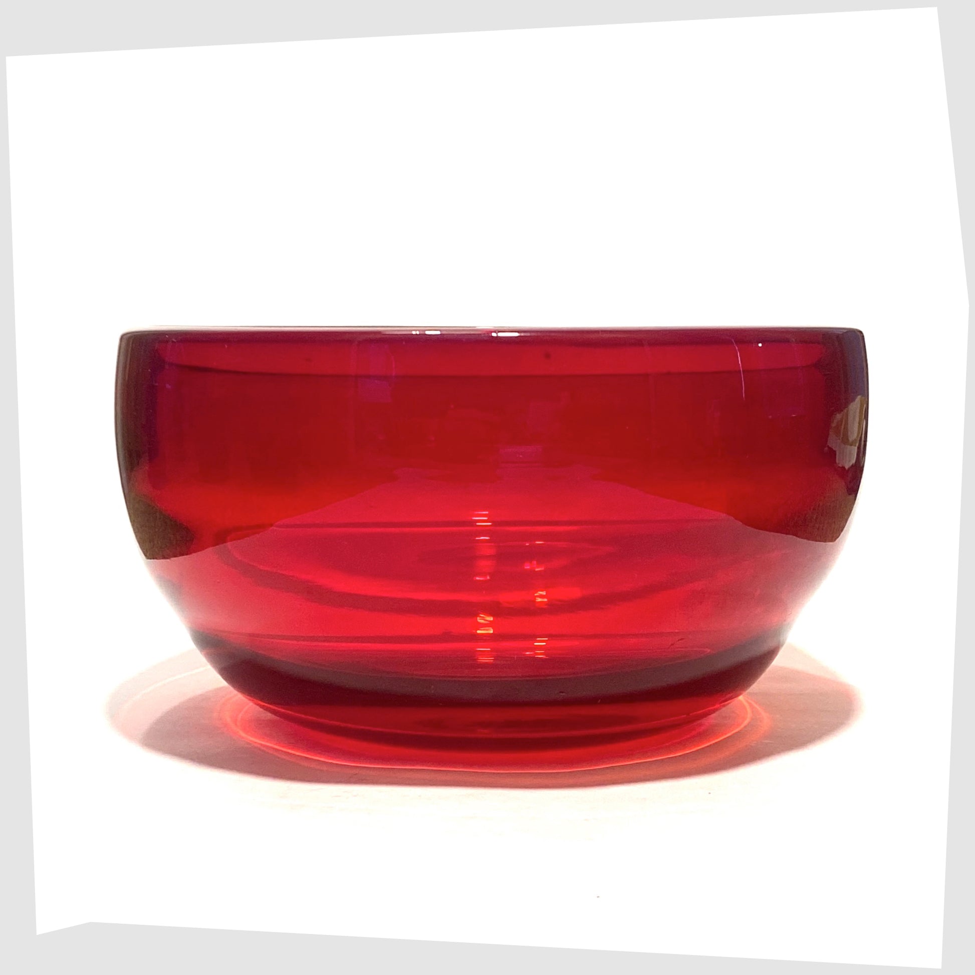 Vintage Whitefriars Glass Optical Bowl in ruby red glass, shown on a white background